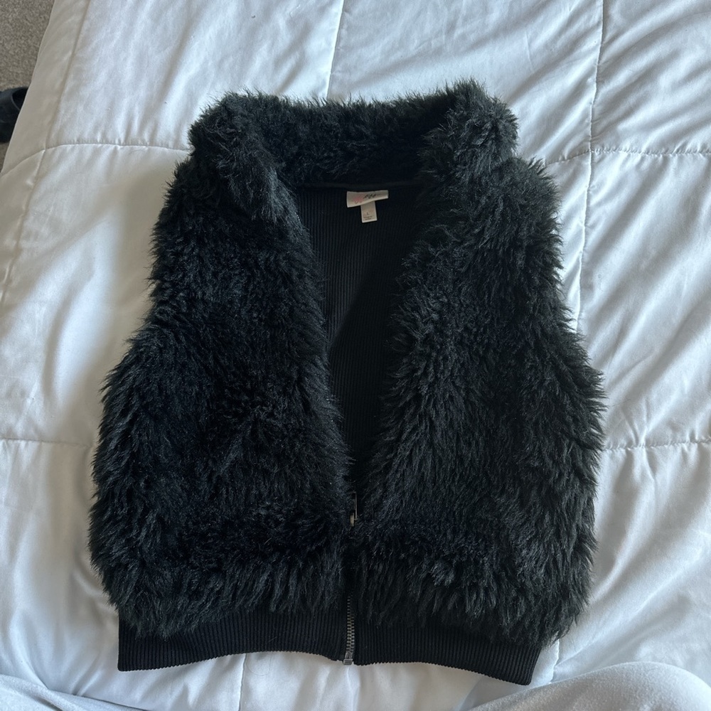 black fuzzy vest!!!